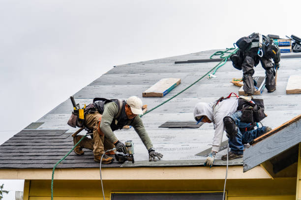 Professional Roofing technician working in Manasquan, NJ